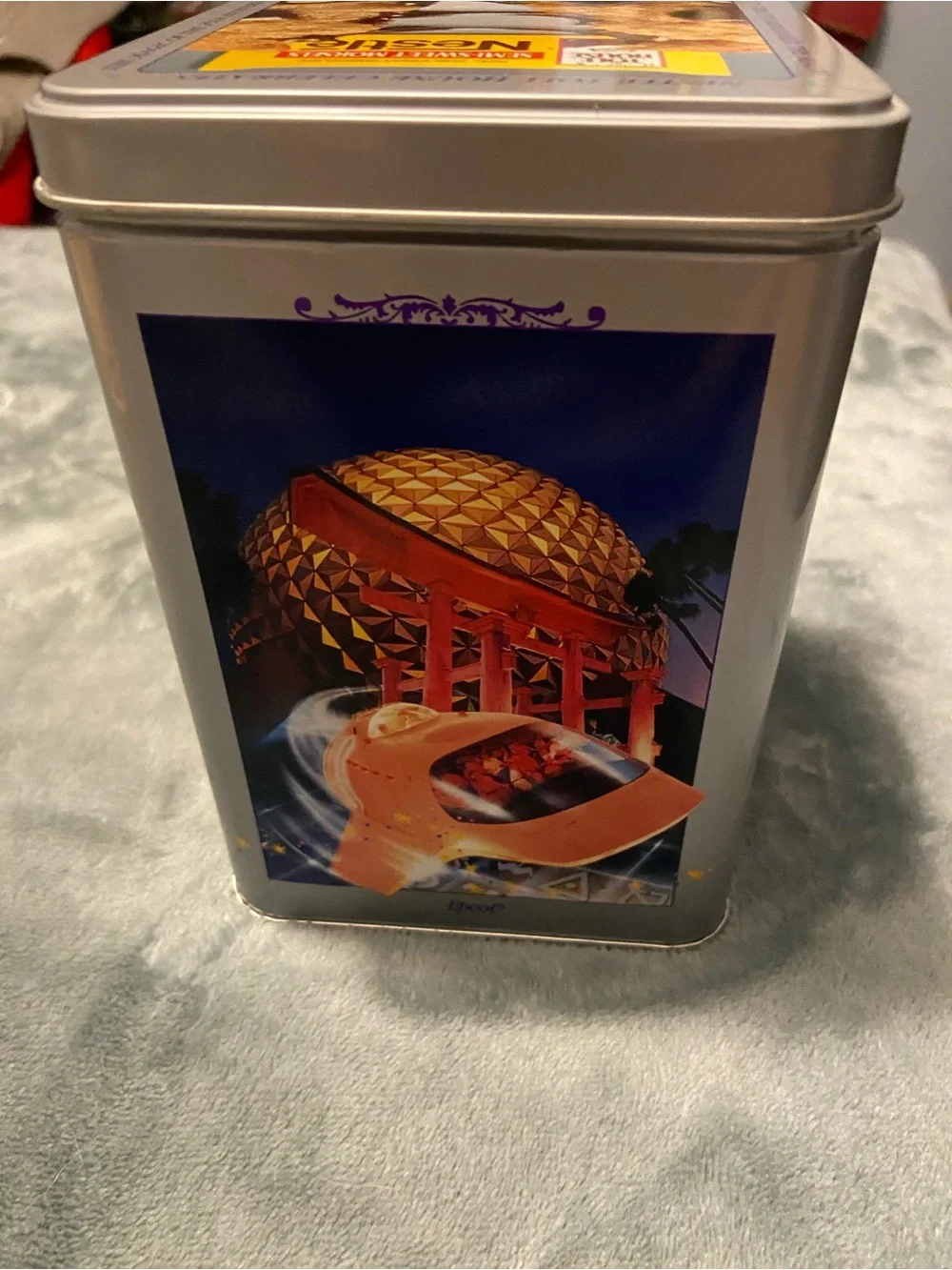 Disney Silver Metal Tin with Blue, Black, Gold and Purple Artwork